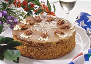 Nut sponge gateau with pecan nuts & white chocolate