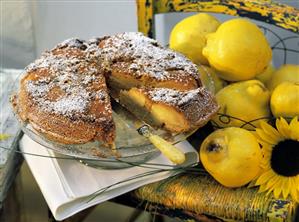 A quince tart, a piece cut, on cake plate (1)