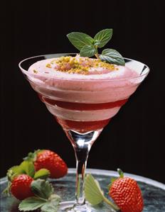 Strawberry mousse with chopped pistachio in dessert shell