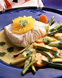 Cod with orange segment and courgettes & carrots