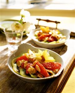 Exotic salad: grapefruit, carambola, kiwi & flaked almonds