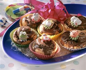 Small cakes with chocolate icing for children's party (1)