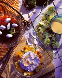 Fruit with vanilla sauce & berry jelly with meringue