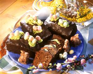 Chocolate cake with sugar eggs & chocolate Easter bunnies