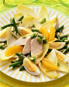 Chicory-bean salad with orange segments & sliced turkey breast