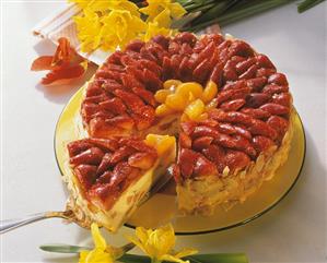 Strawberry and mandarin cream gateau, a piece cut (1)