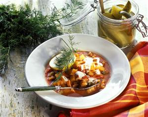 Solyanka (Russian stew with sausage, vegetables & sour cream)