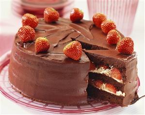 Chocolate strawberry gateau, a piece cut