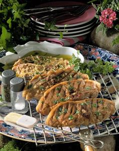 Grilled lemon and ginger lamb cutlets on a rack