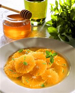 Orange salad with honey, olive oil and mint