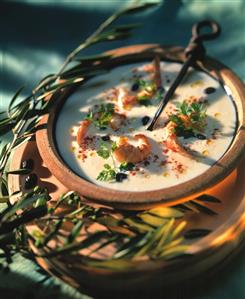 A Bowl of Cream Soup with Shrimp