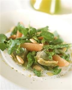 Corn salad with artichokes, asparagus and grapefruit