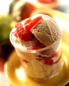 Coffee ice cream with segmented grapefruit in glass