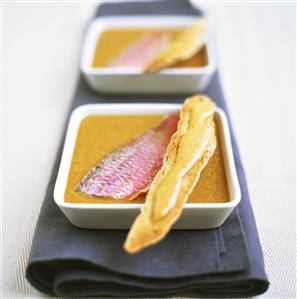 Pureed fish soup, above, red mullet and bread stick