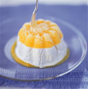 Passion fruit ice cream dessert on glass plate (1)