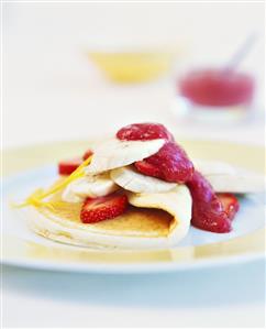 Pancake with banana and strawberry filling