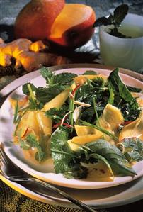 Mixed herb salad with mango and ginger