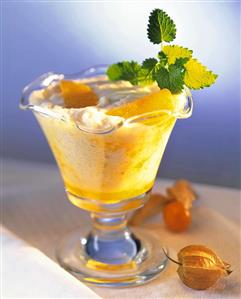 Banana milk shake, decoration: mint leaf & cape gooseberry