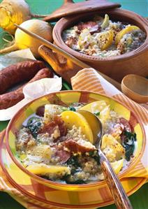 Turnip and barley stew and Polish sausages