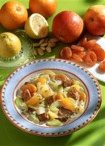 Celery stew with oranges, apricots & flaked almonds