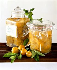 Mirabelle preserve in jars and a few mirabelles