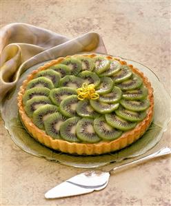 Kiwi tart on cake plate