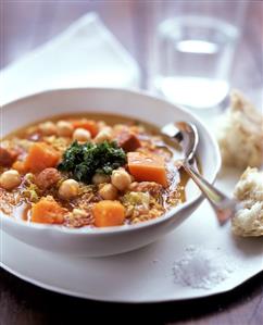 Stew with chick peas, pumpkin and paprika sausage