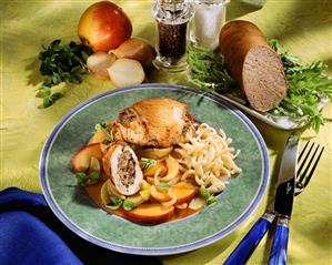 Stuffed turkey roll with noodles & nectarine & onion sauce