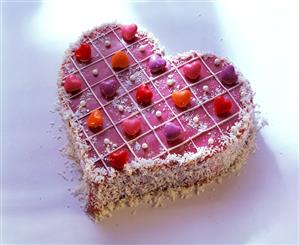 Pink love-heart with coconut flakes & heart-shaped sweets (1)