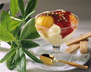 Peach melba (Poached peach with ice cream & raspberry sauce)