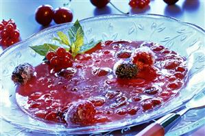 Red berry cream in glass bowl