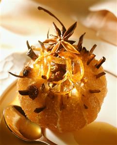 Stuffed orange with raisins, star anise and cinnamon