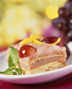 Layered sweet of grape blancmange & butter biscuits