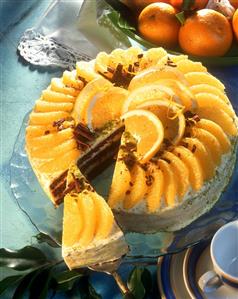 Orange and chocolate gateau, one piece cut