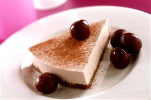 A piece of cherry mascarpone cheesecake