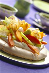 Meringue gateau with exotic fruit