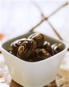 Mocha chocolates in white bowl