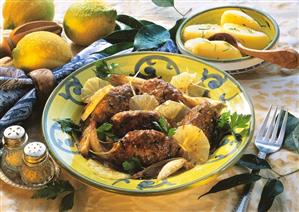 Beef dumpling with lemon sauce and lemon slices