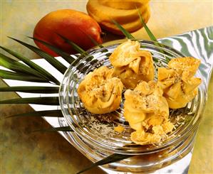 Strudel parcels with coconut and mango filling