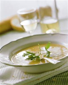 Chick pea soup with baguette as accompaniment