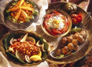 Indian table with kebabs, raita, chick peas & lentils (1)