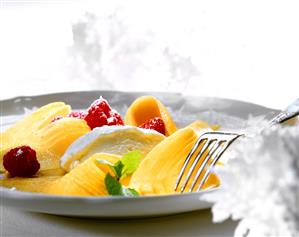 Mango carpaccio with quark mousse