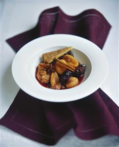 Dried fruit in red wine sauce