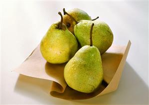 Green pears on paper