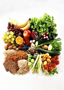 Still life with fruit, vegetables, wholemeal bread & pasta