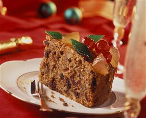 Piece of fruit cake with candied fruit for Christmas