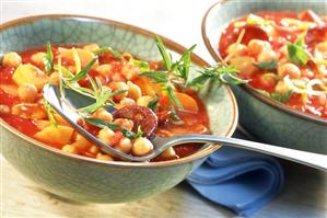 Chick pea stew with tomatoes, potatoes and chorizo sausage