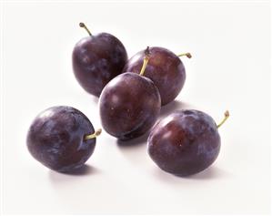 Five damsons with stalk