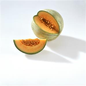 Cantaloupe melon, a quarter cut out