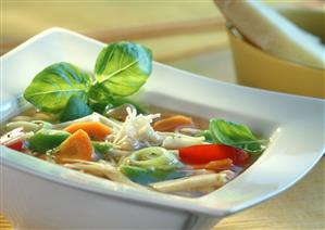 Minestrone in square china plate